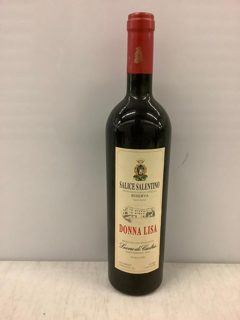 Donna Lisa Red Wine 750 ML: Any contents in bottle is Free; You are bidding on the bottle & unbroken tax stamp