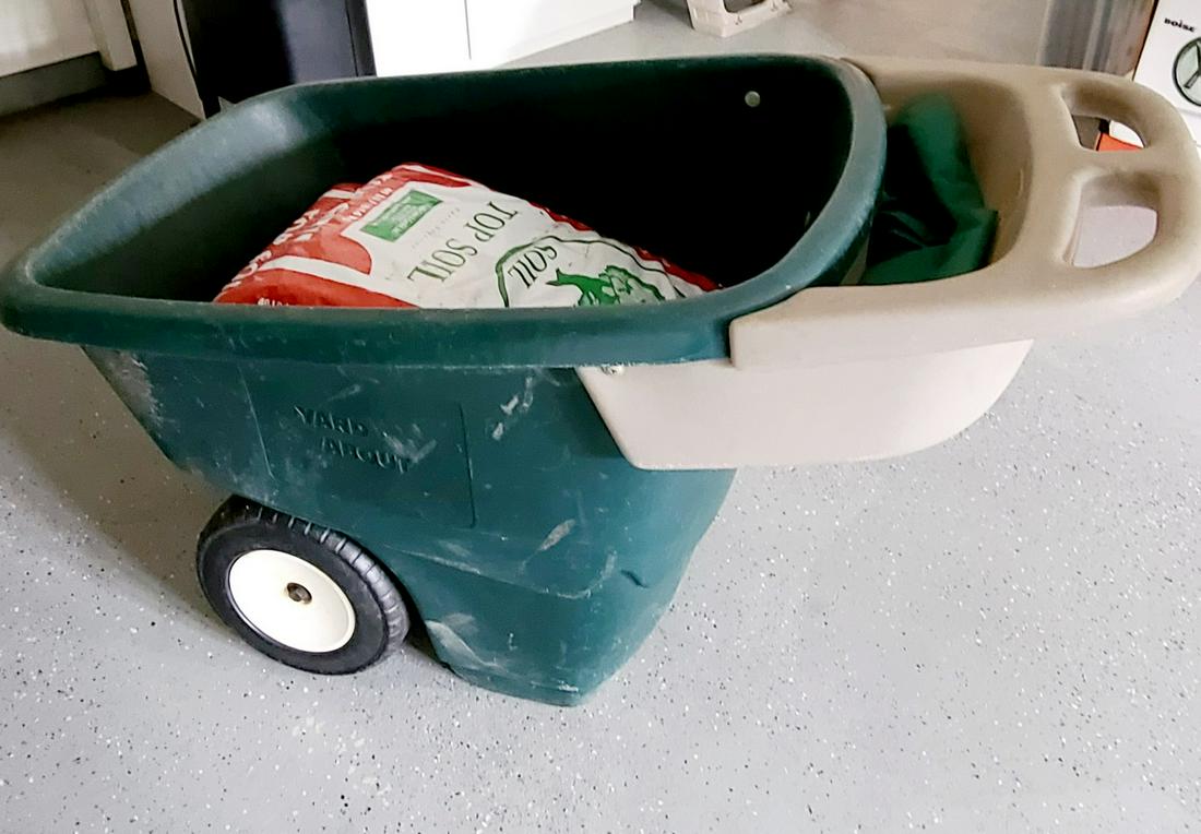 yard about plastic wheelbarrow and topsoil (1 of 1)