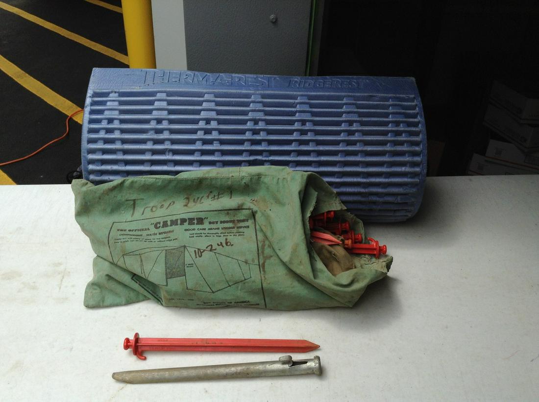 Thermarest Ridgerest camping mat and bag of tent stakes (1 of 1)
