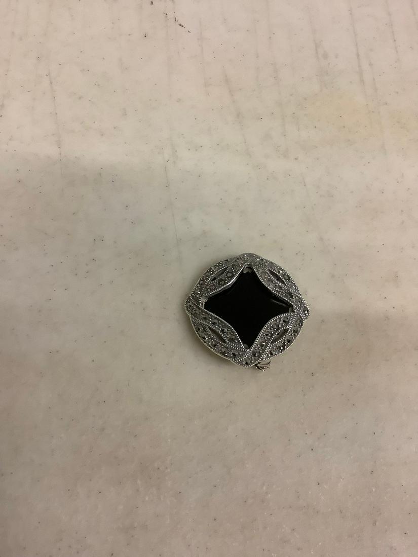 sterling marcasite and black onyx pin: sterling marcasite and black onyx pin