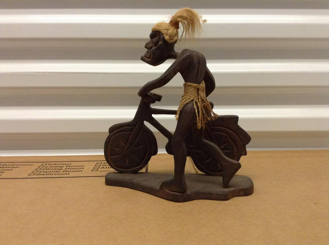 Carved figure walking bicycle 8.5" tall (1 of 1)