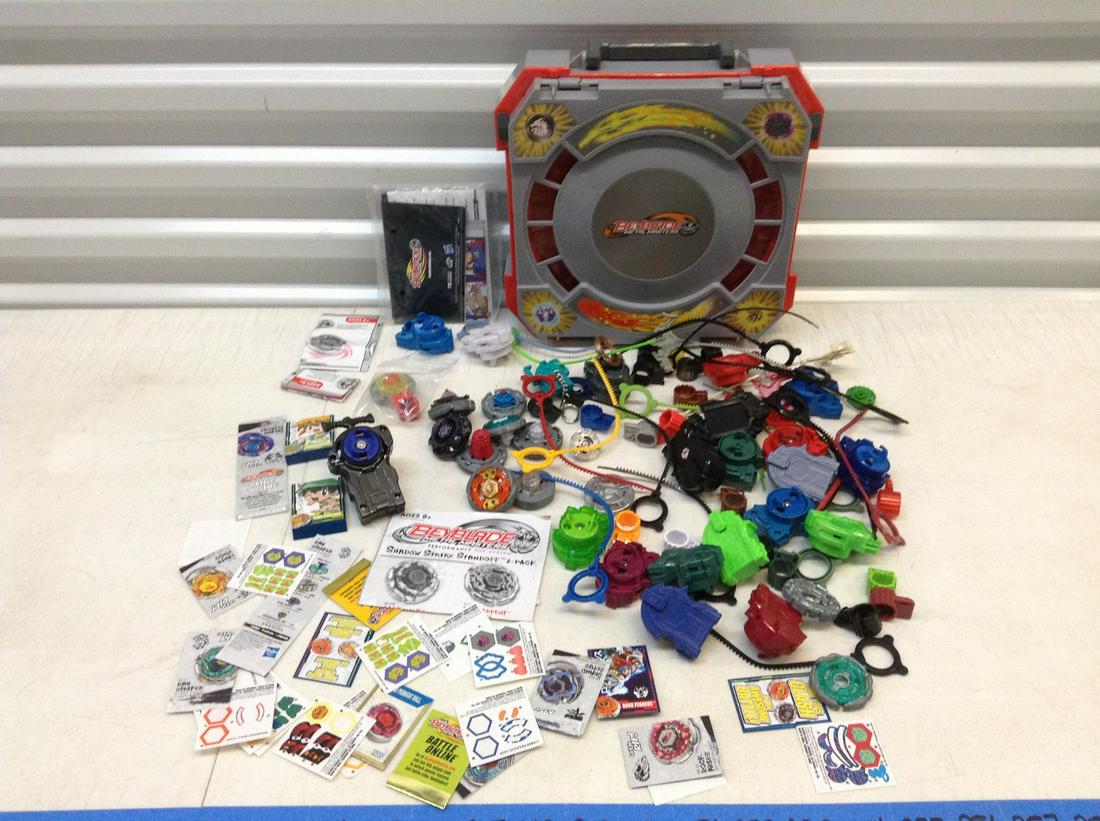 Large Lot of Bey Blade Toys, Carrying Case and more: Large Lot of Bey Blade Toys, Carrying Case and more