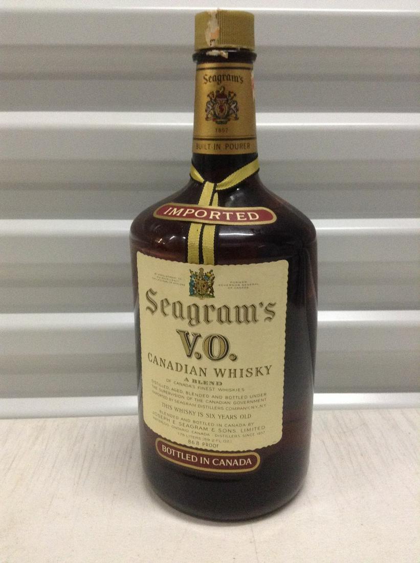 1973 Seagram's V.O Whiskey 1.75L (Open But bottle Full): Any contents in bottle is Free; You are bidding on the bottle & unbroken tax stamp