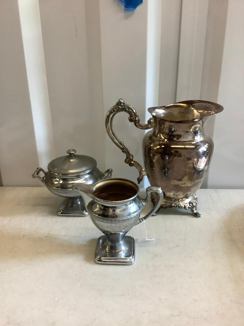 Lot of silver plate oneta, and manning bowman tallest 9: Lot of silver plate oneta, and manning bowman tallest 9 inches
