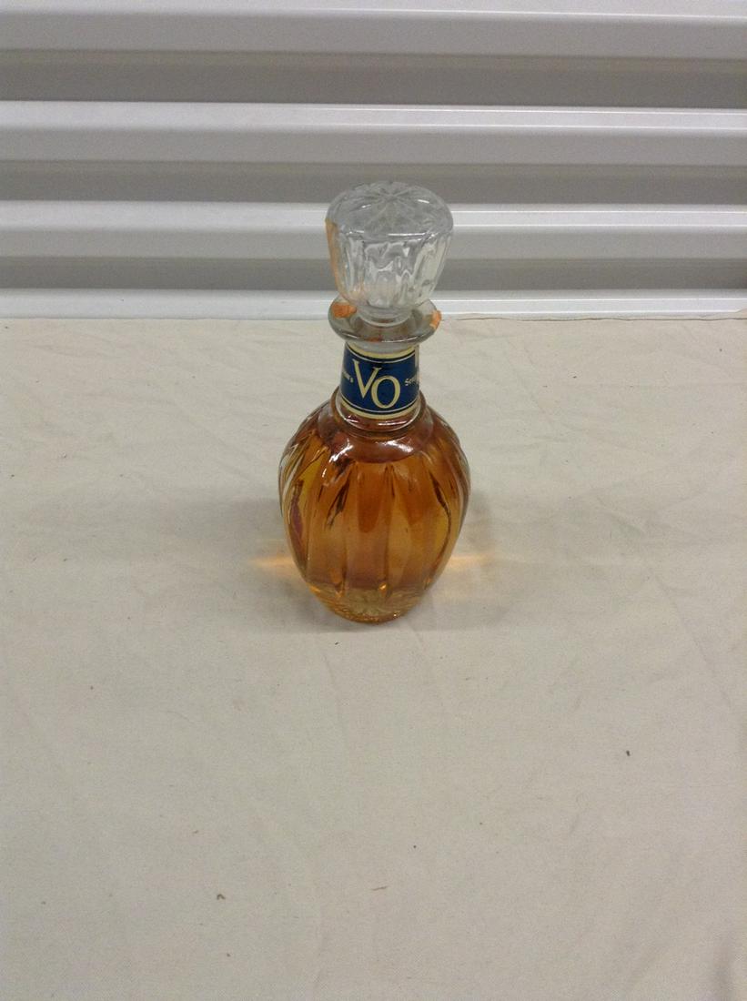 Seagram's VO 1977: Any contents in bottle is Free; You are bidding on the bottle & unbroken tax stamp
