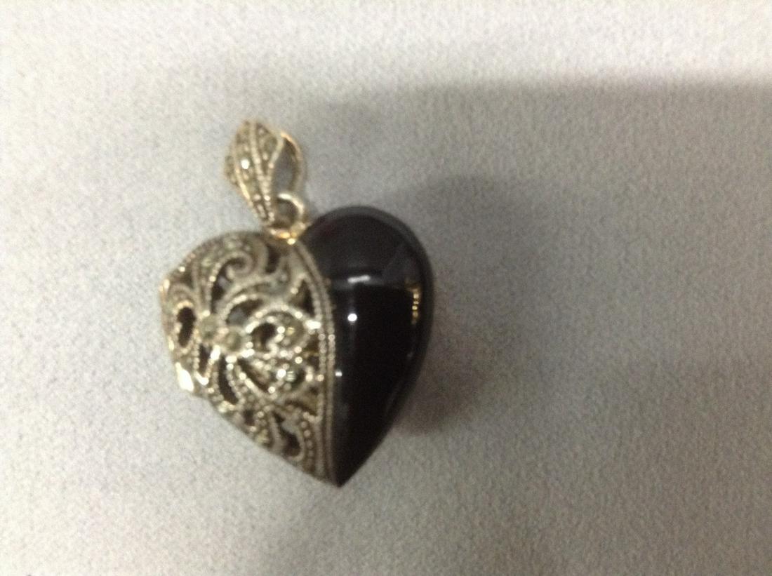 Sterling Silver, Marcasite and Onyx Locket Marked 925: Sterling Silver, Marcasite and Onyx Locket Marked 925 1.5"