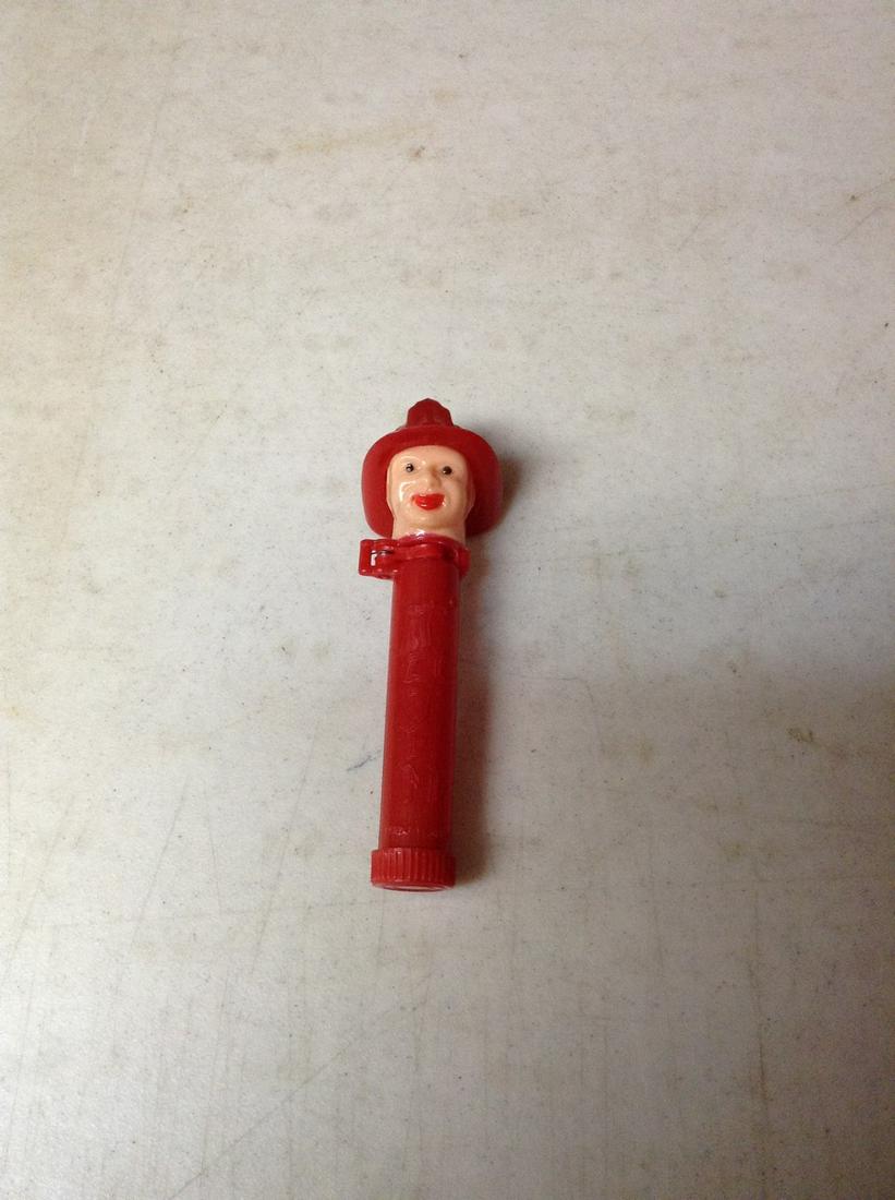 Very early fireman pez dispenser totem (1 of 1)
