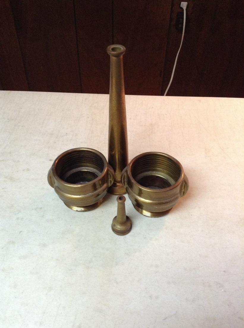 Fire hose couplers and vintage brass nozzles (1 of 1)