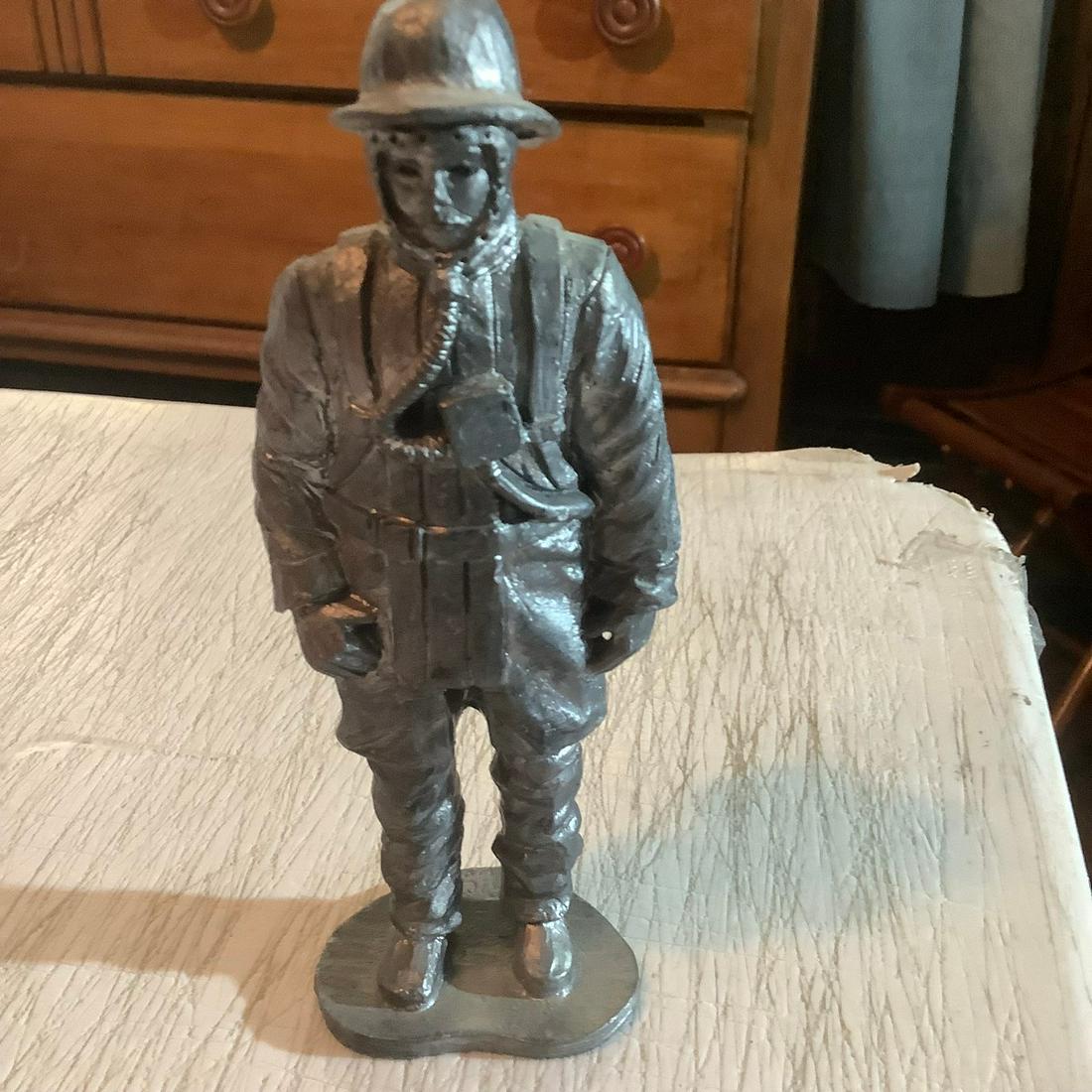 M.A. Ricker Signed 1992 Fireman Pewter Figurine 7x2 in.: M.A. Ricker Signed 1992 Fireman Pewter Figurine 7x2 in.