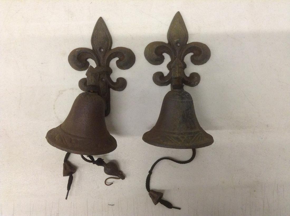 Two Cast Iron Fluer De Lis Dinner Bells (1 of 1)