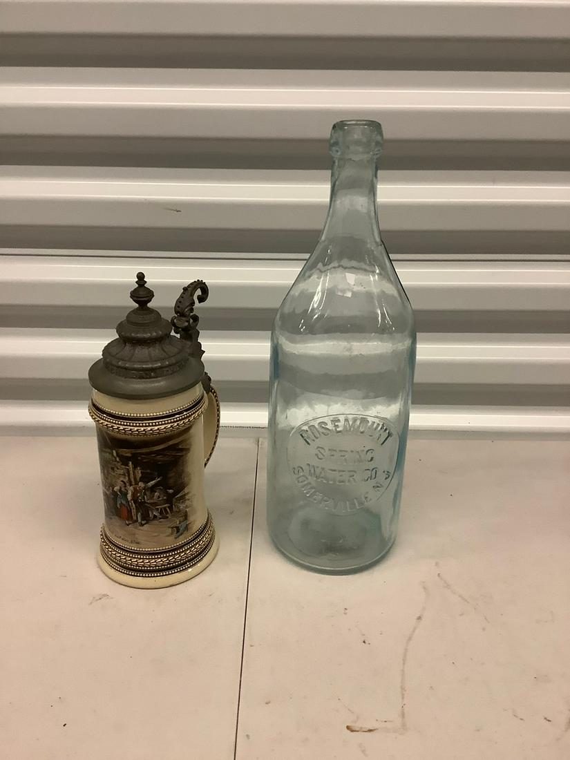 EMbossed rosemont spring water bottle and lidded beer (1 of 1)