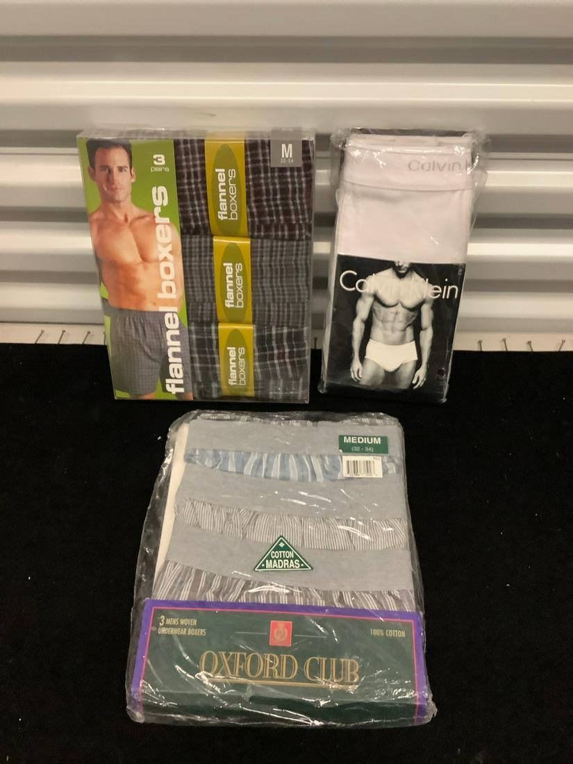 3 packages unopened mens underwear plus calvin klein: 3 packages unopened mens underwear plus calvin klein briefs