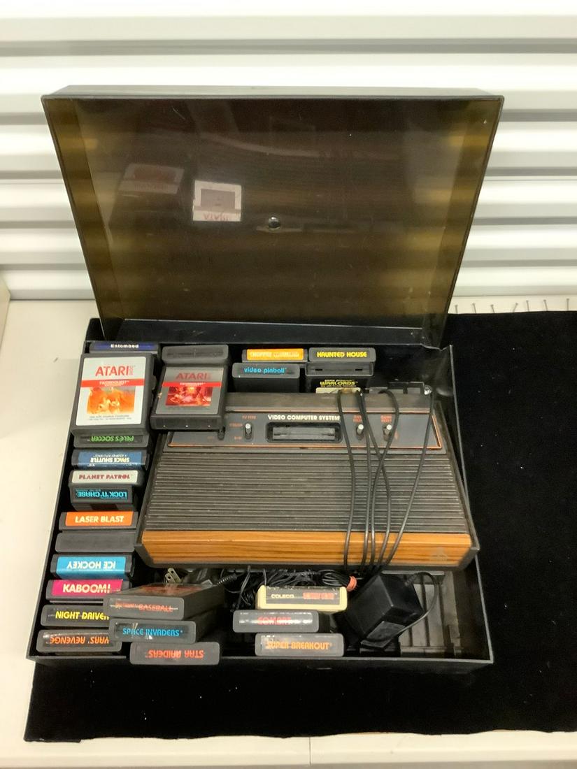 Vintage Atari 2600 with games,and storage case (1 of 1)