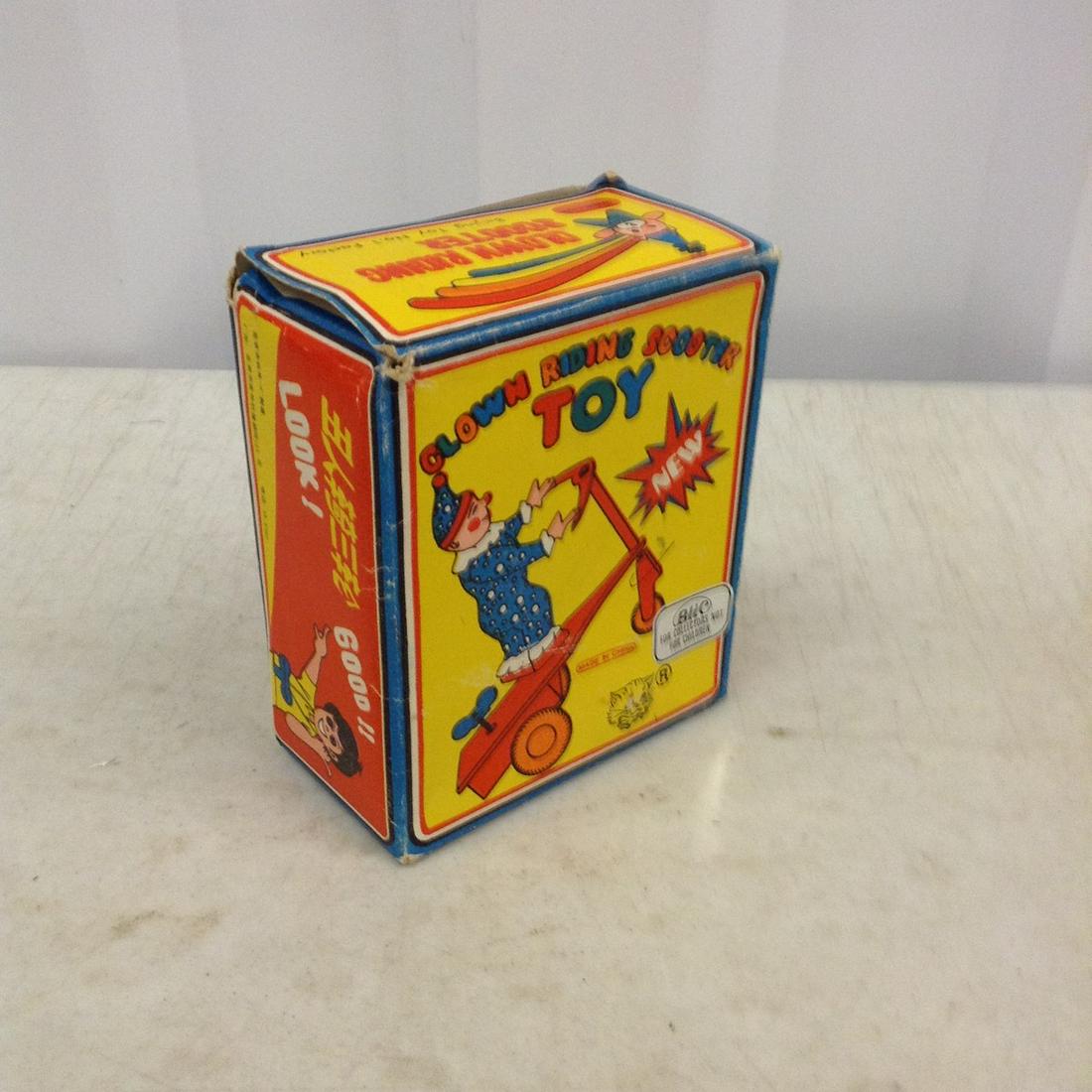 BLIC clown riding scooter toy: BLIC clown riding scooter toy