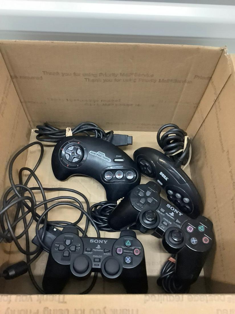 Lot of Sega and Playstation 2 controllers (1 of 1)