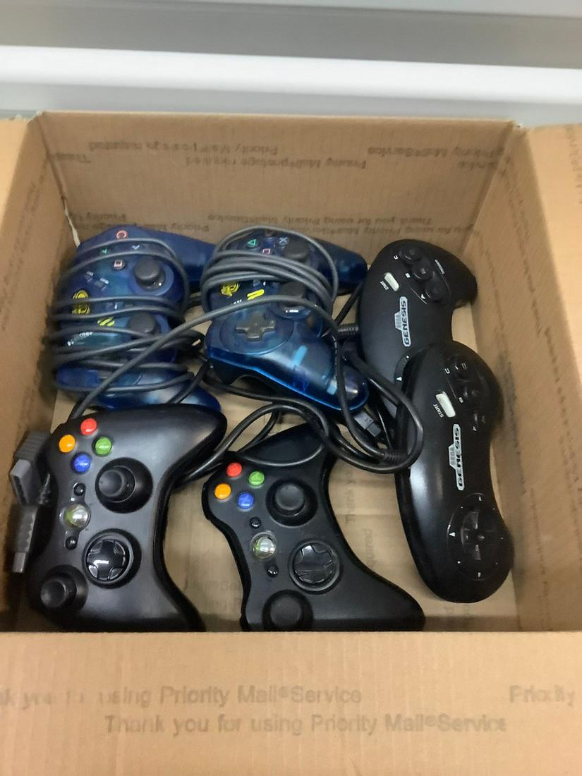Lot of sega, xbox 360 and playstation 2 controllers (1 of 1)