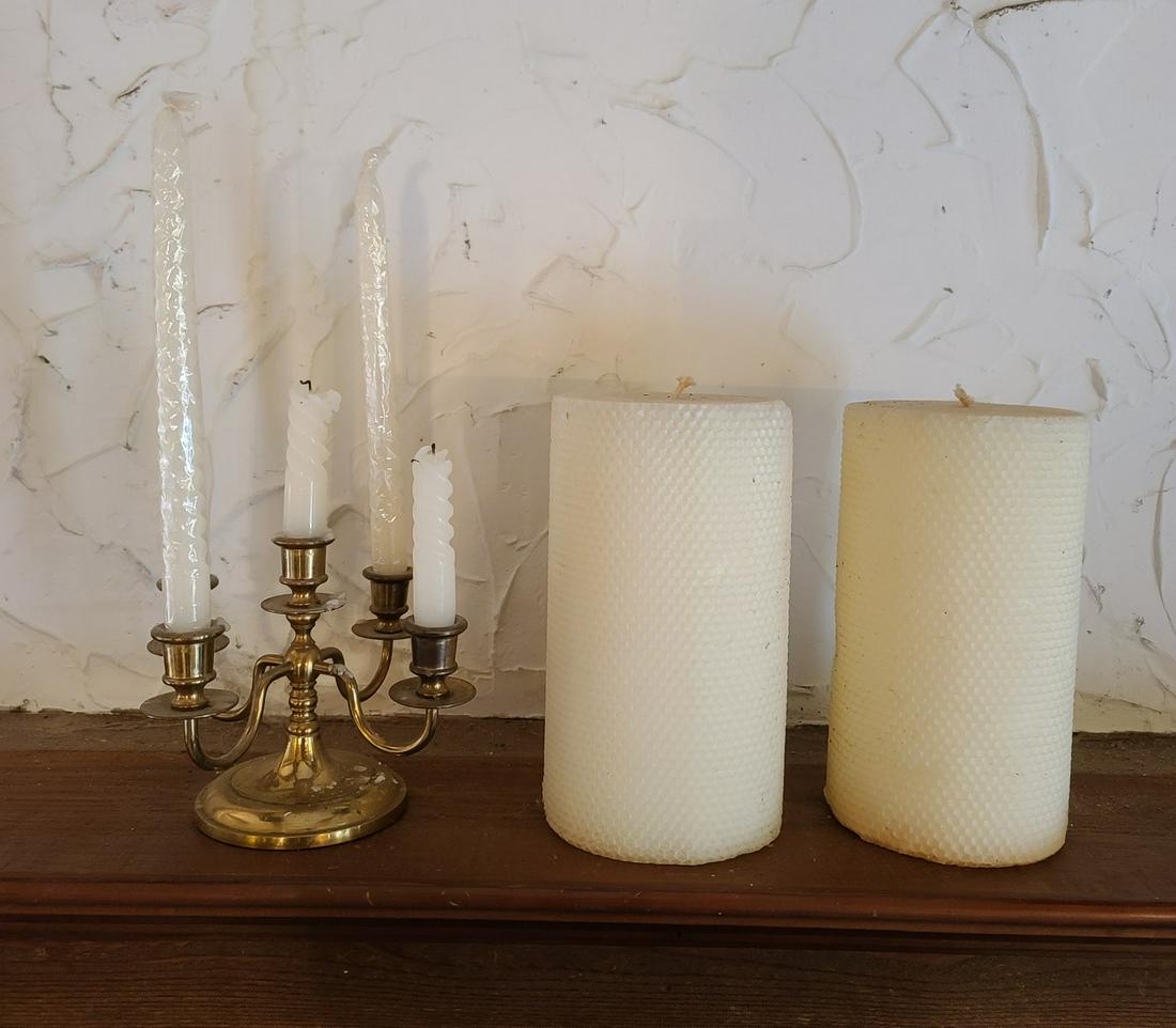 brass candelabra and 2 lrg beeswax candles: brass candelabra and 2 lrg beeswax candles