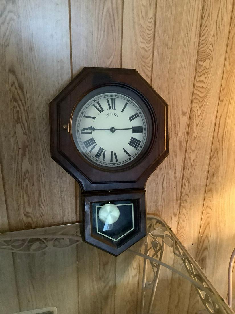 Wooden bullova pedulum wall clock 21 inches tall: Wooden bullova pedulum wall clock 21 inches tall
