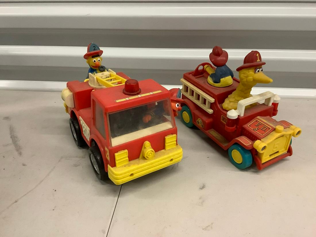 Lot of vintage Illco Sesame Street fire trucks: Lot of vintage Illco Sesame Street fire trucks