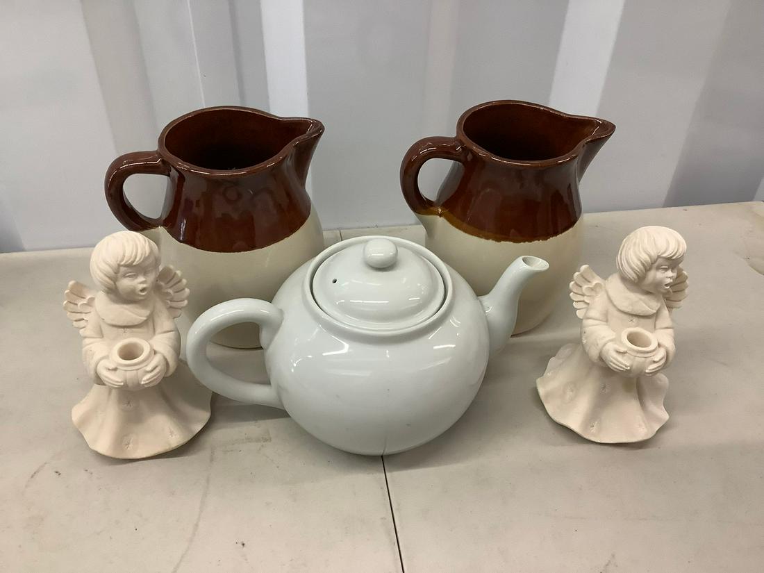 Cherub candle holders, ceramic pitchers and teapots (1 of 1)