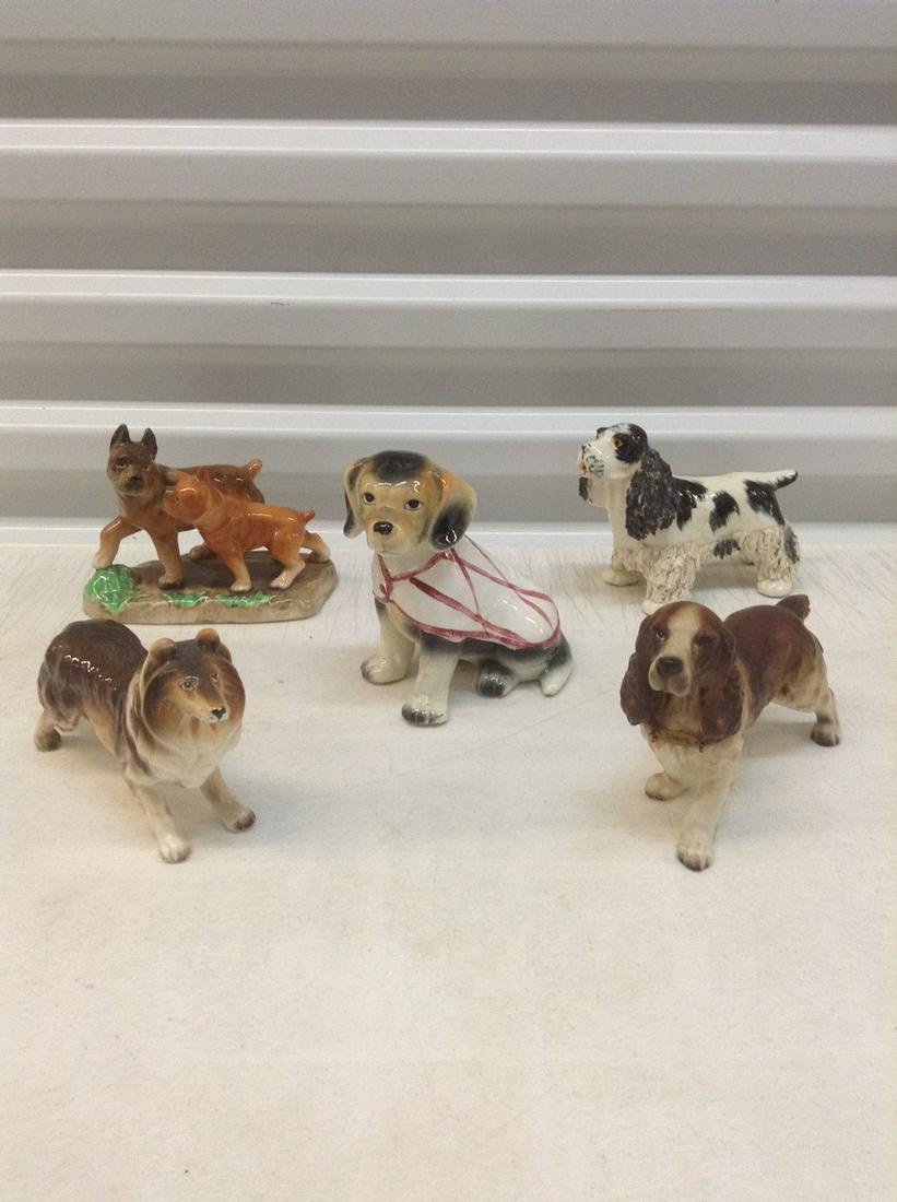 Lot of Dogs Statues Marked Made in Japan largest 6" (1 of 1)