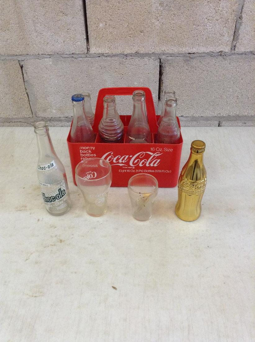 Lot of vintage soda bottles coca cola and more and coca: Lot of vintage soda bottles coca cola and more and coca cola carrier