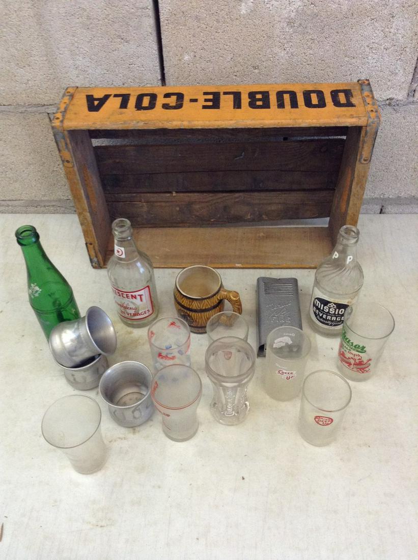 Lot of vintage soda bottles and more in crate: Lot of vintage soda bottles and more in crate