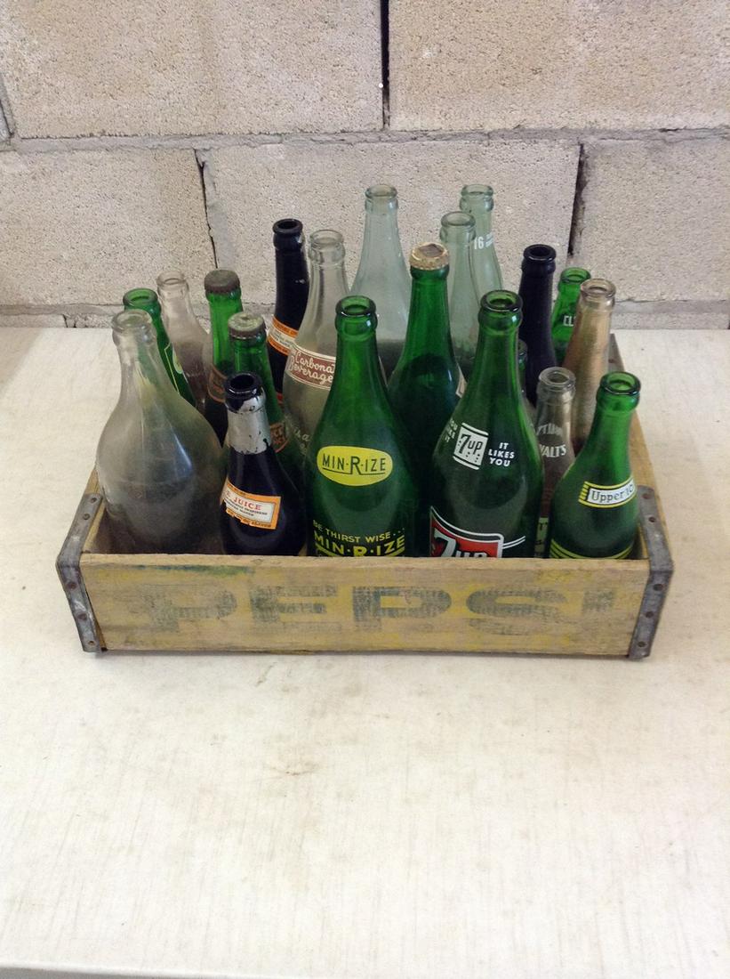 Lot of various vintage soda bottles in crate: Lot of various vintage soda bottles in crate