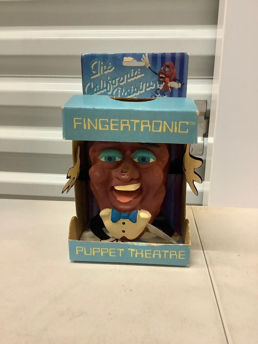 California Raisan fingertronic puppet theater 6 inches: California Raisan fingertronic puppet theater 6 inches tall