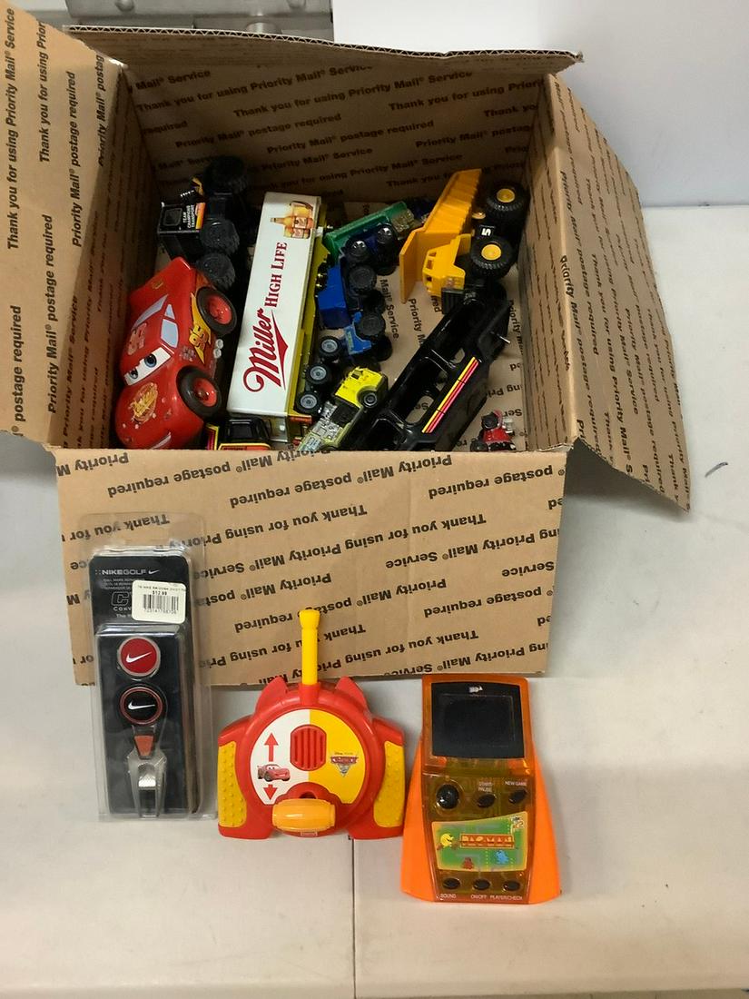 Lot of toy trucks, handheld pacman, and more (1 of 1)