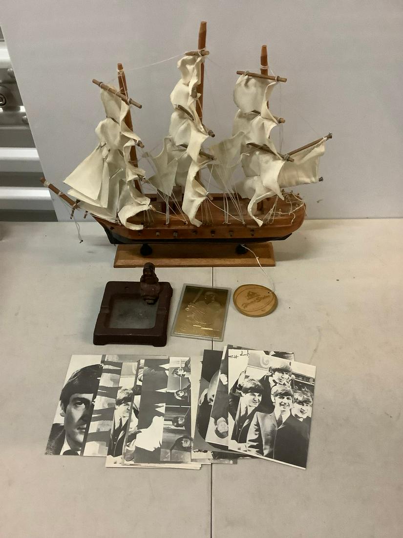 Antique cast iron ashtray, decorative sailing ship,: Antique cast iron ashtray, decorative sailing ship, gold babe ruth card, beatles picture cards