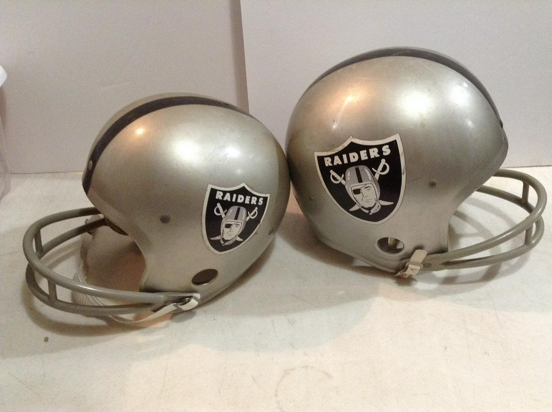 Two Vintage Raiders Helmets (1 of 1)
