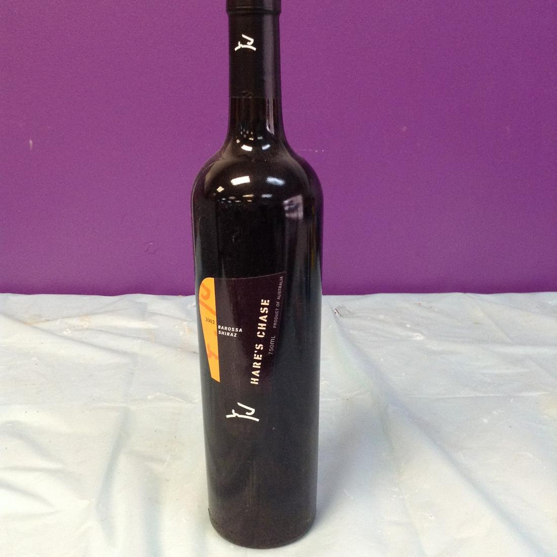 2002 Barossa Shiraz Hare's Chase 750ML: Any contents in bottle is Free; You are bidding on the bottle & unbroken tax stamp