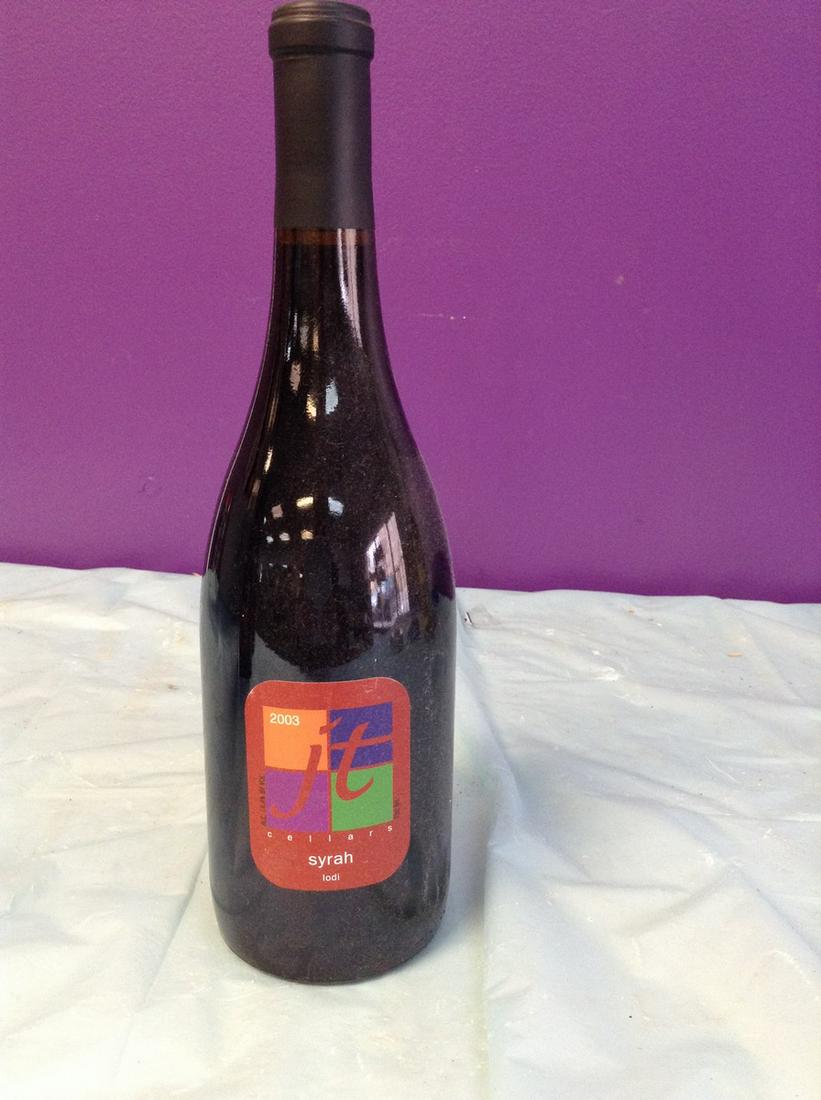 2003 JT Cellars Syrah 750 ML: Any contents in bottle is Free; You are bidding on the bottle & unbroken tax stamp