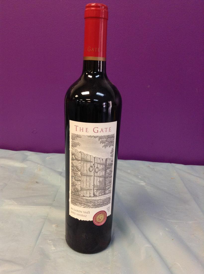 The Gate 2002 Shiraz 750ML: Any contents in bottle is Free; You are bidding on the bottle & unbroken tax stamp