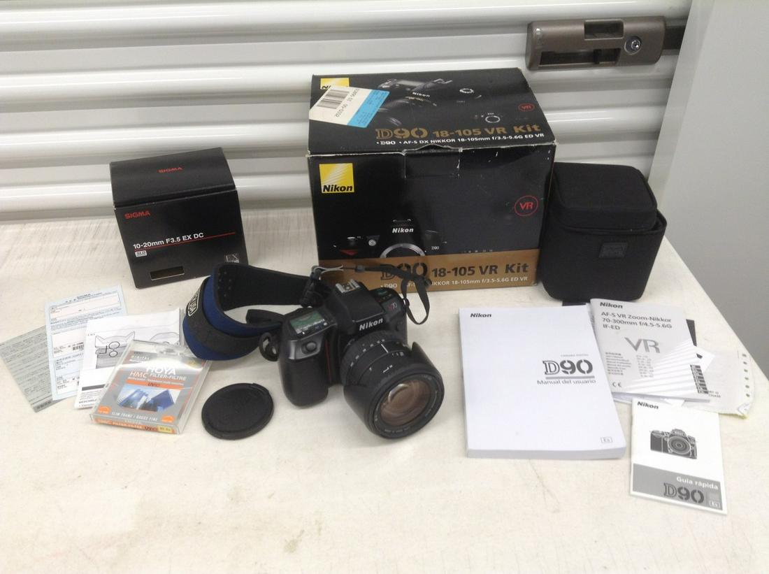 Nikon D 90 Camera & Sigma Lens with boxes and paperwork: Nikon D 90 Camera & Sigma Lens with boxes and paperwork