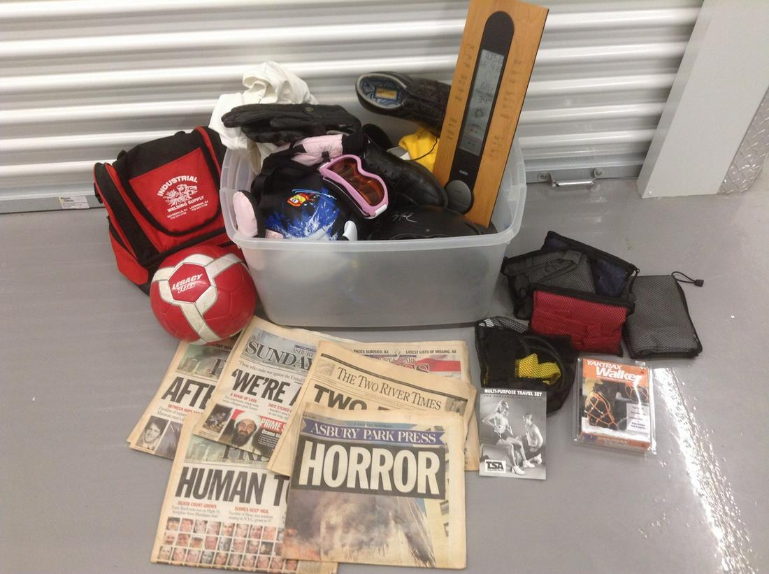 Basket full of Outdoor Flood Light Bulbs, Recessed Bulbs, Home Improvement Items and Rain Boots (1 of 1)