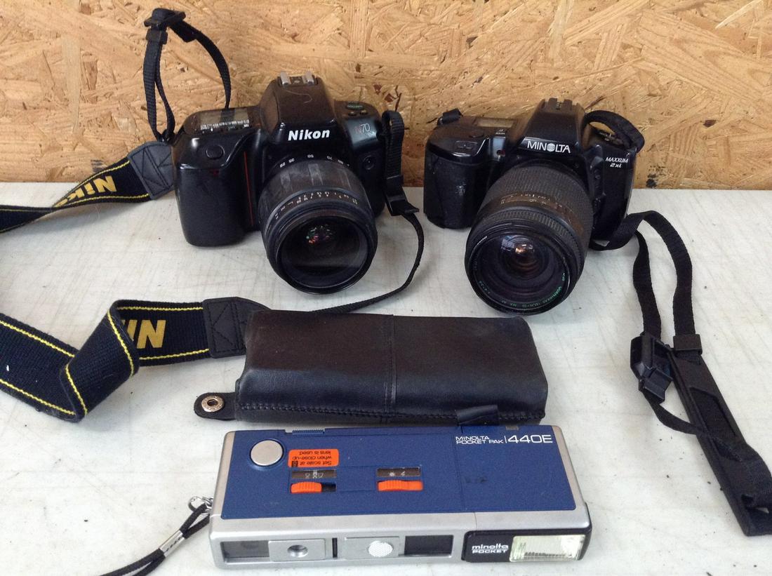 Minolta Pocket Pak 440E, Nikon N70 w/Tamron 28-80mm Lens, and Minolta Maxim 2xi w/unknown lens: Minolta Pocket Pak 440E, Nikon N70 w/Tamron 28-80mm Lens, and Minolta Maxim 2xi w/unknown lens