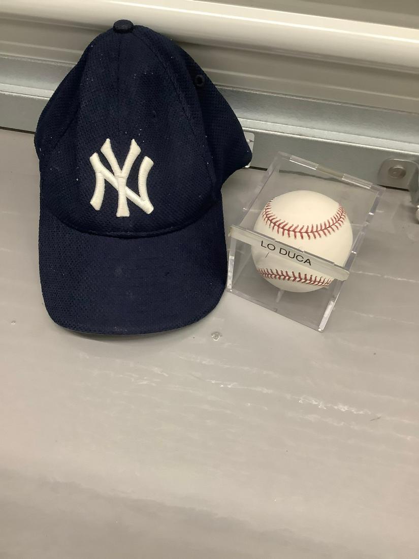 Signed Lo Duca baseball and NY Yankees baseball cap (1 of 1)