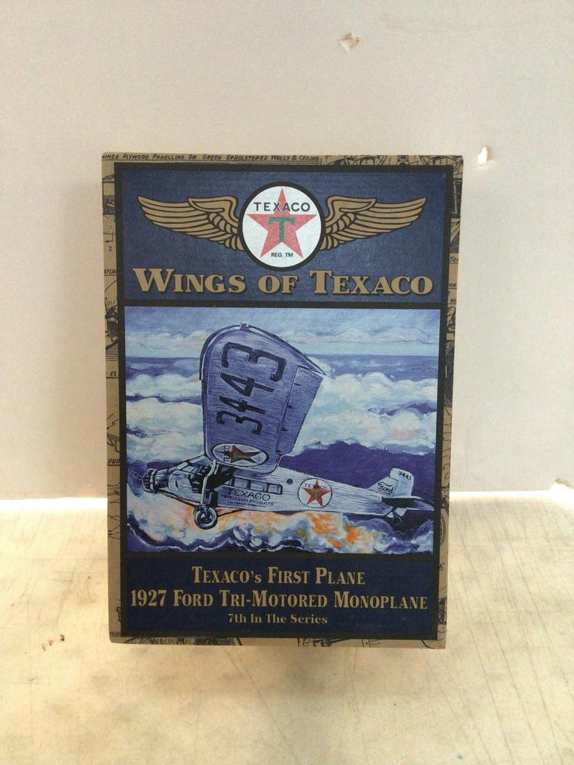 texaco wings of texaco texaco;s first place 1927 ford tri-motored monoplane coin bank: texaco wings of texaco texaco;s first place 1927 ford tri-motored monoplane coin bank
