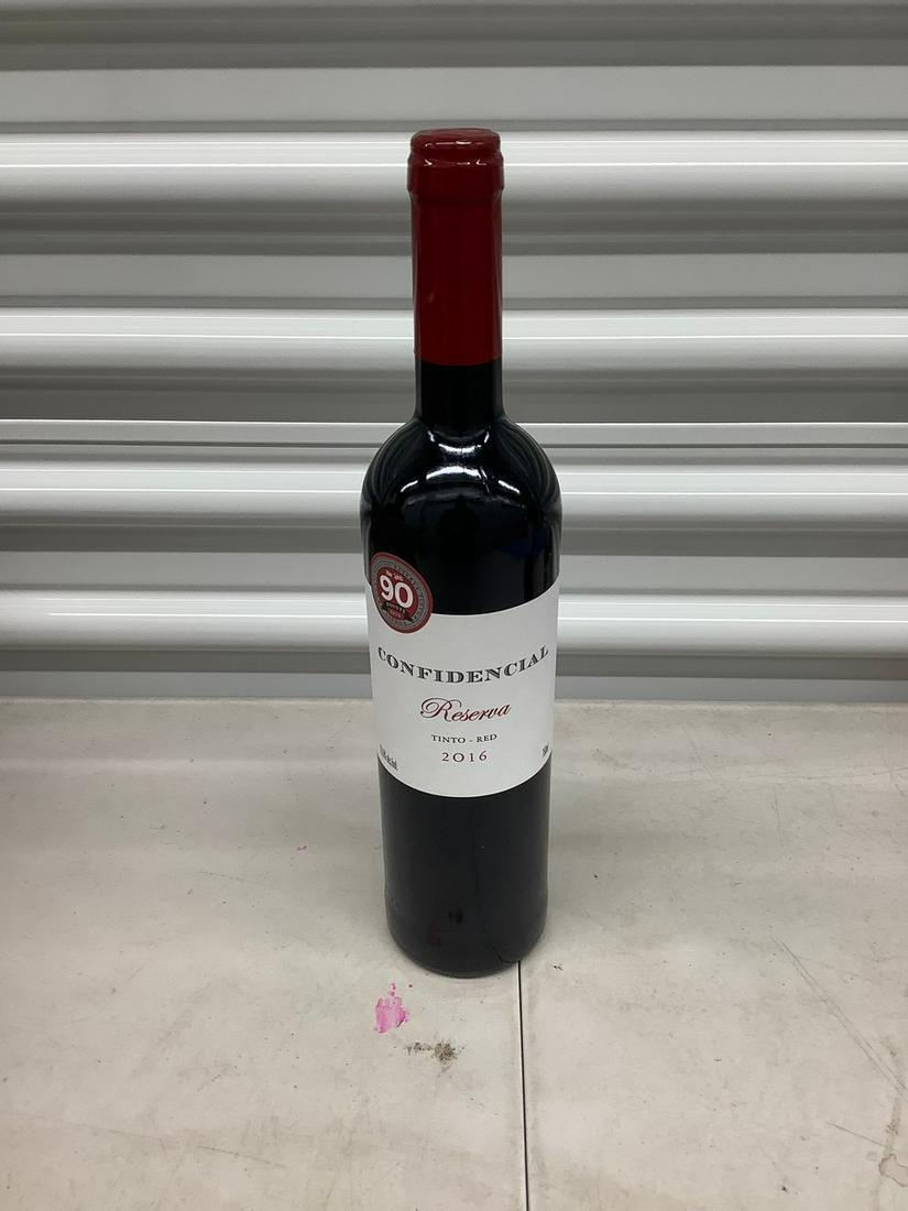 Confidencial Reserva Tinto- Red 2016 750 mL bottle: Any contents in bottle is Free; You are bidding on the bottle & unbroken tax stamp