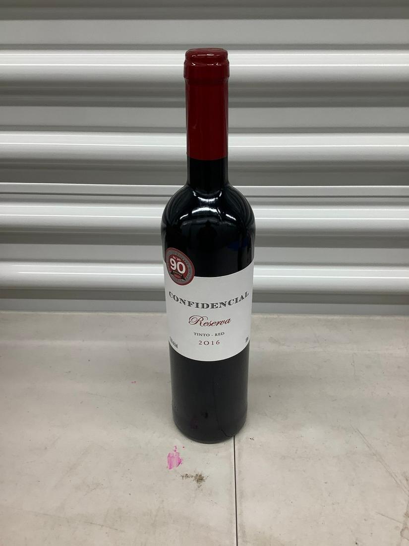 Confidencial Reserva Tinto- Red 2016 750 mL bottle: Any contents in bottle is Free; You are bidding on the bottle & unbroken tax stamp