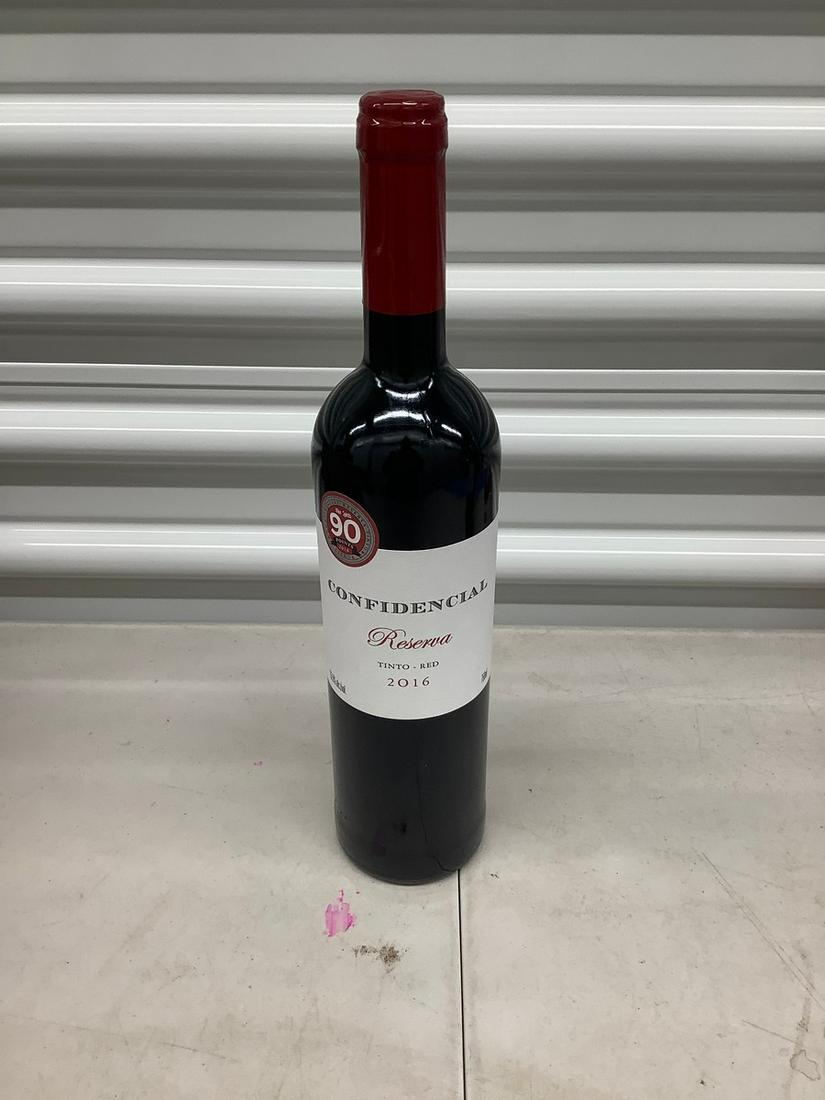 Confidencial Reserva Tinto- Red 2016 750 mL bottle: Any contents in bottle is Free; You are bidding on the bottle & unbroken tax stamp