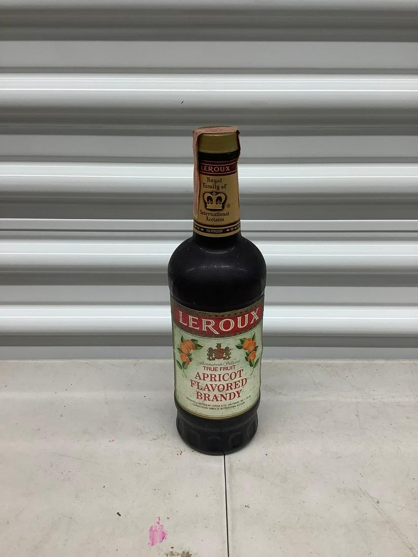 Leroux apricot flavored brandy sealed with tax stamp: Any contents in bottle is Free; You are bidding on the bottle & unbroken tax stamp
