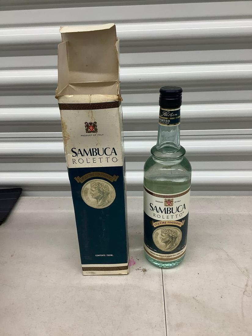 Sambuca Roletto 750 mL bottle: Any contents in bottle is Free; You are bidding on the bottle & unbroken tax stamp