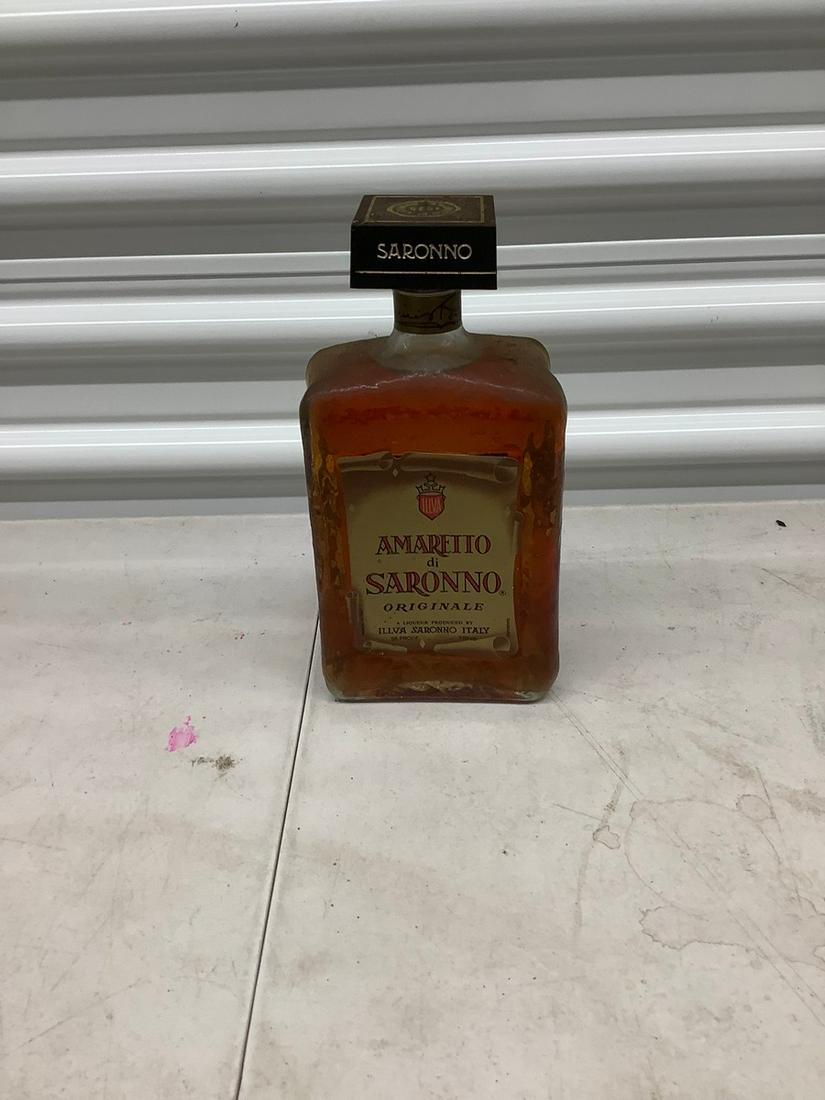 Amaretto disaronno sealed 750 ml bottle: Any contents in bottle is Free; You are bidding on the bottle & unbroken tax stamp