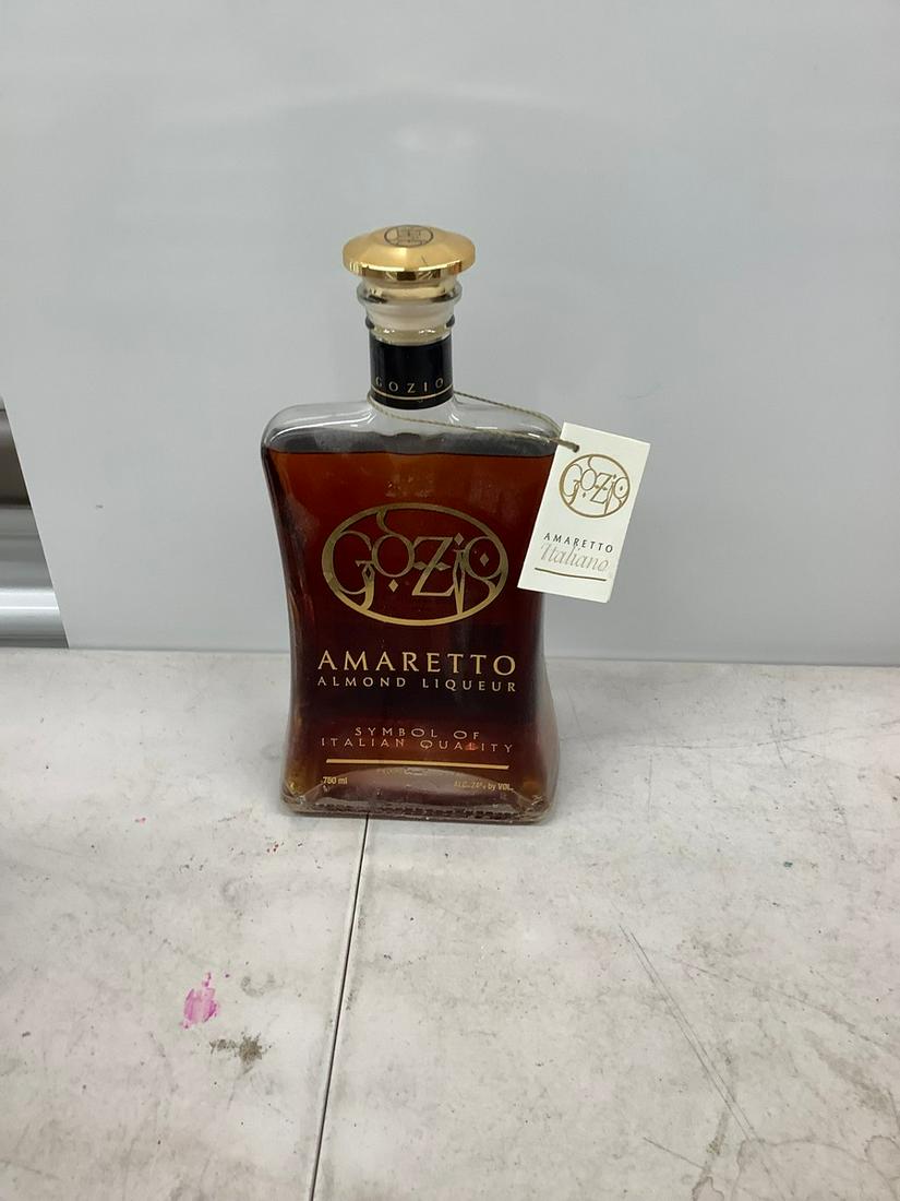 750mL Gozio Amaretto almond liqueur: Any contents in bottle is Free; You are bidding on the bottle & unbroken tax stamp