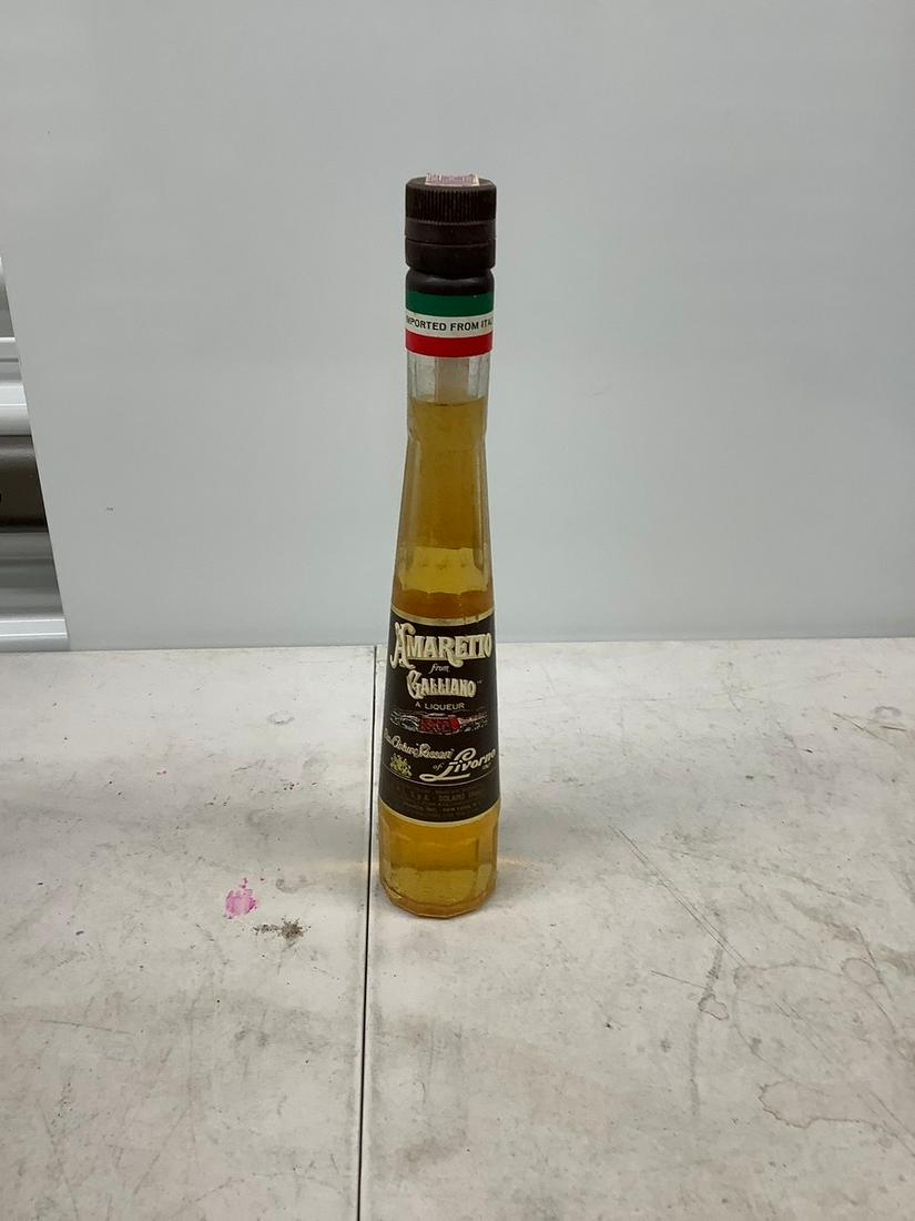 Amaretto from Galliano 200 mL with sealed tax stamp: Any contents in bottle is Free; You are bidding on the bottle & unbroken tax stamp