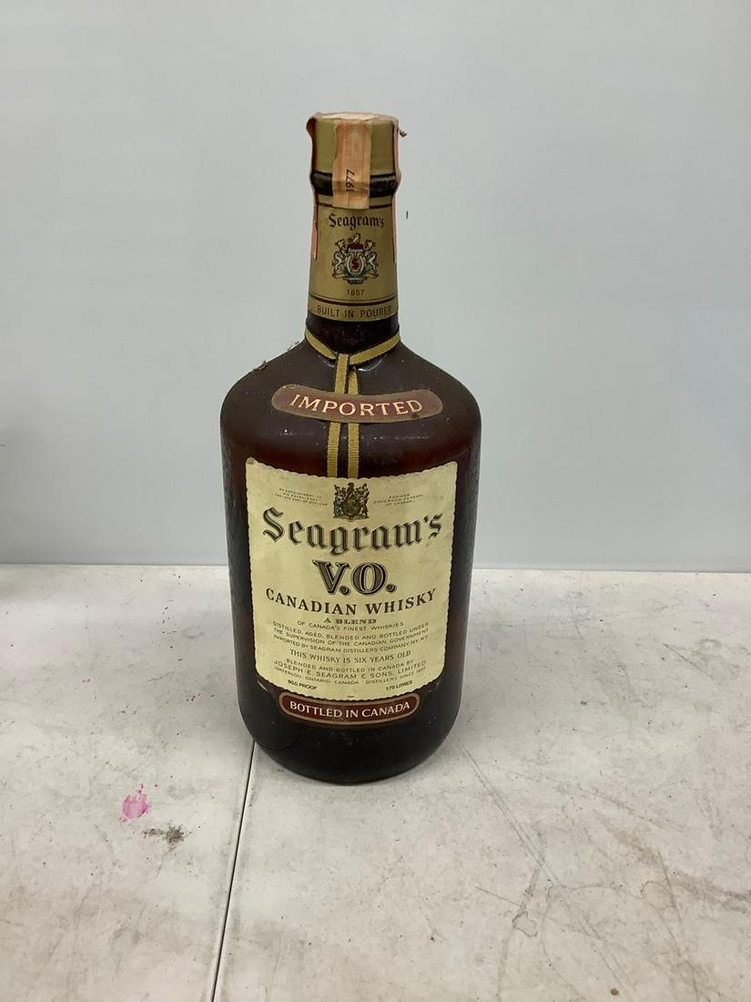 Vintage 1977 segrams VO canadian whiskey sealed tax stamp 1.75 liters: Any contents in bottle is Free; You are bidding on the bottle & unbroken tax stamp