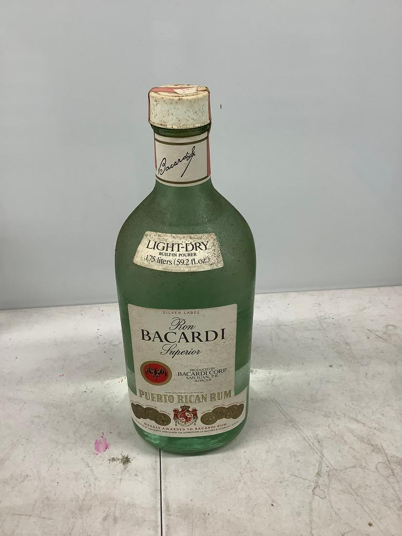 Vintage 1.75 lter bacardi rum sealed tax stamp: Any contents in bottle is Free; You are bidding on the bottle & unbroken tax stamp